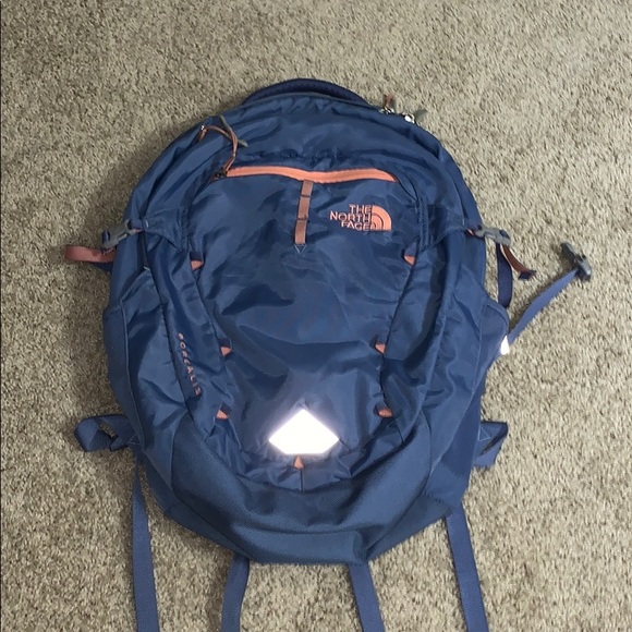 The North face blue and pink backpack.